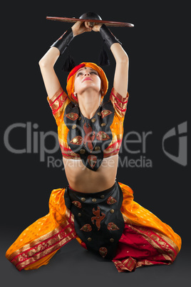 woman oriental dance with shield - arabia costume