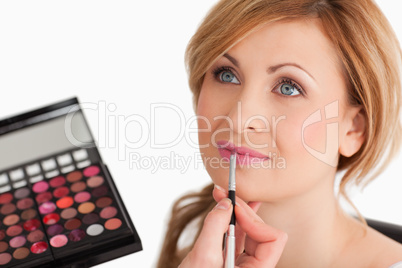 woman getting make up