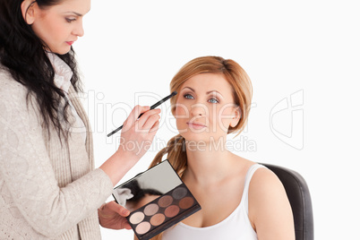 woman getting make up