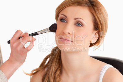 woman getting make up