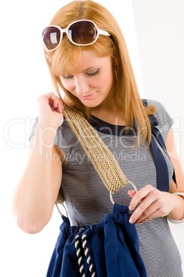 Young marine woman hold handbag