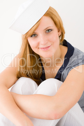 Young marine woman fashion portrait sailor hat