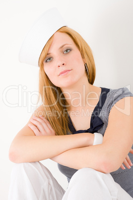 Young marine woman fashion portrait sailor hat
