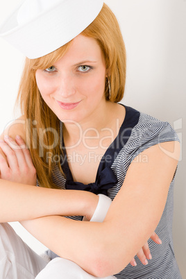 Young marine woman fashion portrait sailor hat