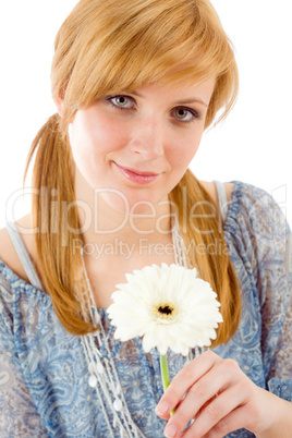 Romantic young woman hold gerbera daisy