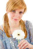Romantic young woman hold gerbera daisy