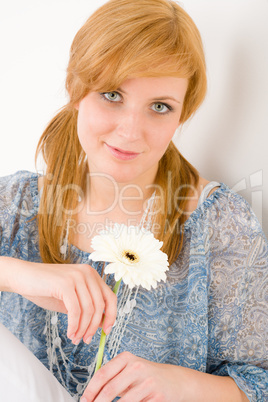 Romantic young woman hold gerbera daisy