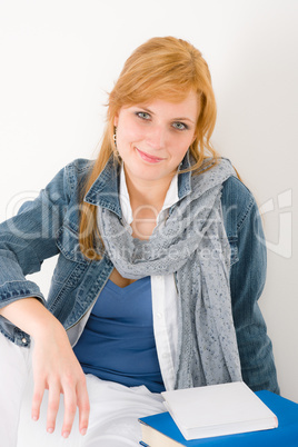 Student young woman portrait with book