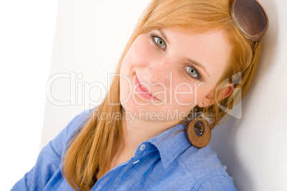 Portrait of young happy woman in designer clothes