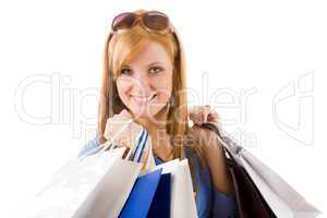 Shopping young woman with paper bag