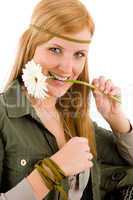 Hippie young woman hold gerbera daisy