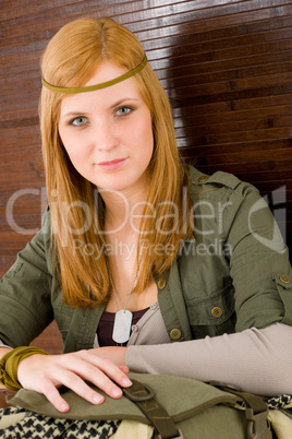 Hippie young woman in khaki outfit