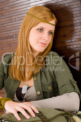 Hippie young woman in khaki outfit