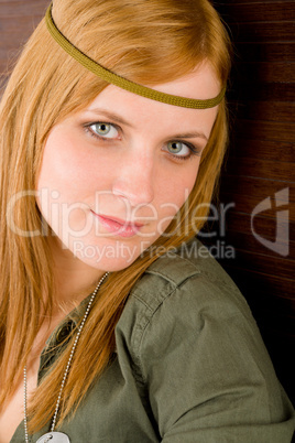 Hippie young woman in khaki outfit