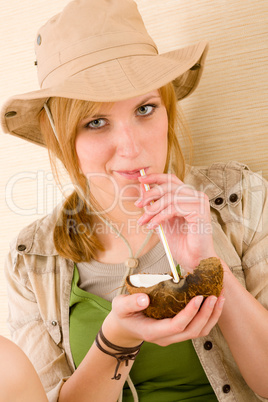 Safari young woman drink straw coconut