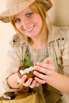 Safari happy young woman with coconut