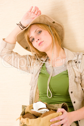Safari young woman with coconut resting