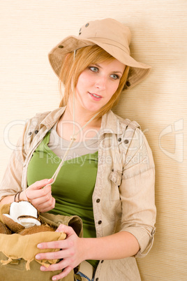 Safari young woman with coconut relaxing