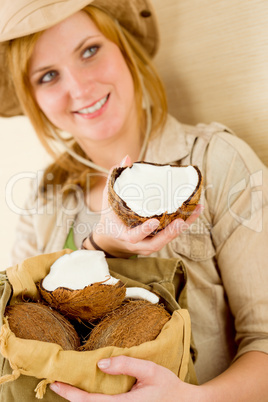 Safari happy young woman with coconut