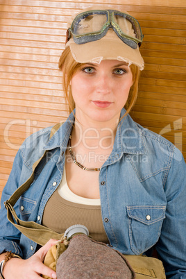 Portrait young woman with pilot goggles