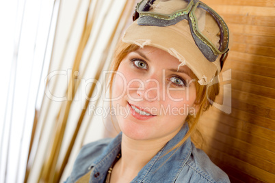 Portrait young woman with pilot goggles