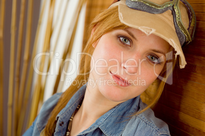 Portrait young woman with pilot goggles