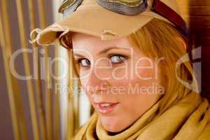 Young woman sunburned face with pilot goggles