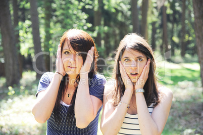 two pretty girls in the wood