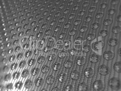 Carbon fibre surface with round shapes pattern