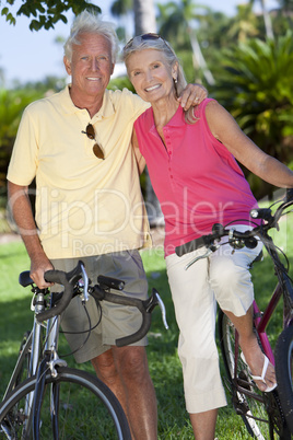 Happy Senior Couple on Bicycles In Green Park