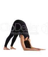 woman stand in yoga pose - Adho Mukha Svanasana