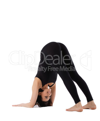 woman stand in yoga pose - Adho Mukha Svanasana