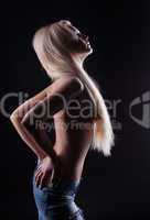Attractive naked blond woman with long hair