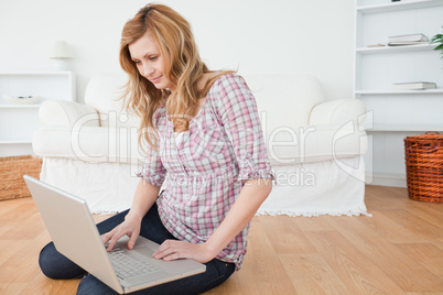 Attractive woman surfing on her laptop