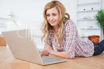 Attractive woman chatting on her laptop