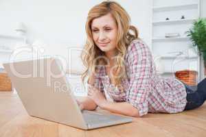 Attractive woman chatting on her laptop