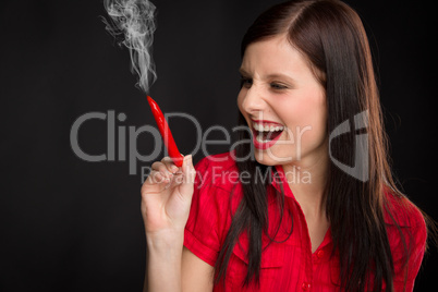 Chili pepper portrait young woman smoke red hot