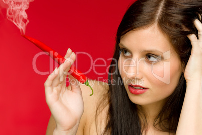 Chili pepper portrait young woman smoke red hot