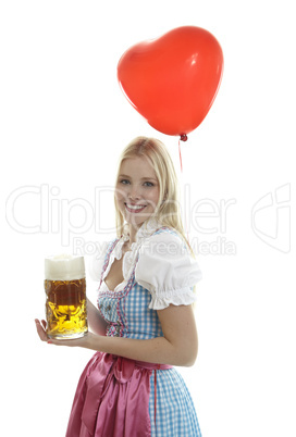 Frau im Dirndl mit Ballon