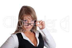 Young woman in business suit look over glasses
