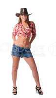 Beautiful Cowgirl stand in shorts and smile