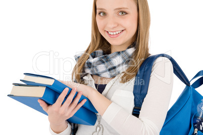 Student teenager woman with schoolbag hold books