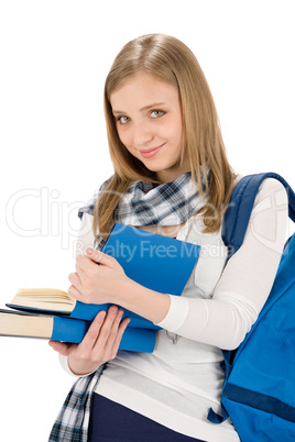 Student teenager woman with schoolbag hold books