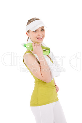 Fitness teenager woman in sportive outfit hold bottle