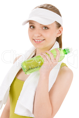 Fitness teenager woman in sportive outfit hold bottle