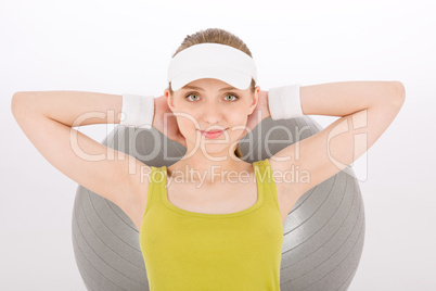 Fitness teenager woman exercise in sportive outfit