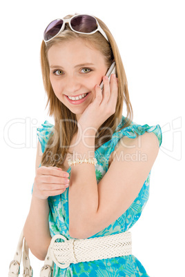 Teenager woman with mobile phone in summer