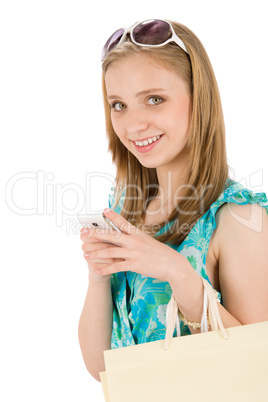 Shopping teenager woman with mobile phone