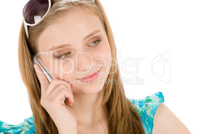 Teenager woman with mobile phone in summer