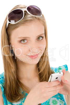 Teenager woman with mobile phone in summer